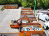 Sperrmüll wird von einem Mobil Jumbo im Container verdichtet